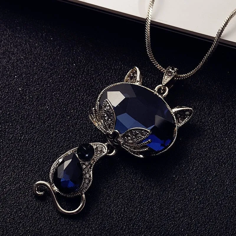 Collier pendentif silhouette de chat en cristal bleu SUATYKAT™